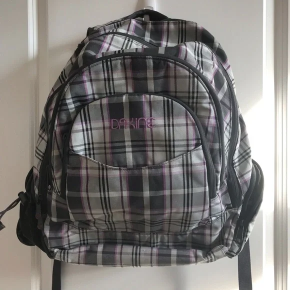 dakine mini backpack rn 91245 Essentials 7L access items and two mesh water bottle pockets on the sides Dakine Essentials Mini 7L Backpack